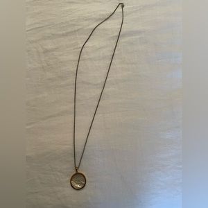 Used Asha Necklace. Taurus sign.